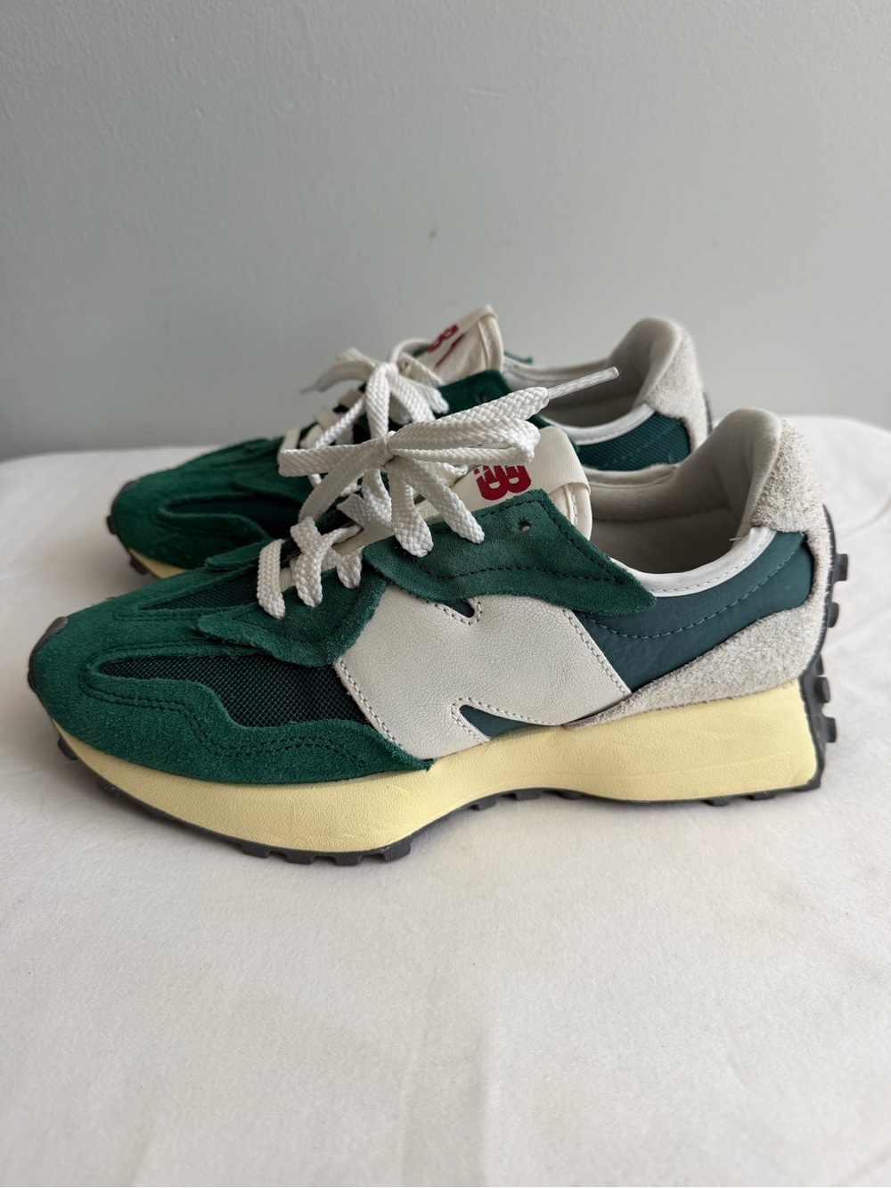 New Balance 327 sneakers in retro green and off-white